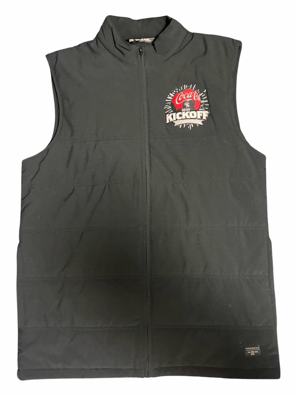 Travis Mathew Black Quilted Sleeveless Vest with Coca-Cola Kickoff Logo